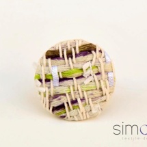Green white and purple ring