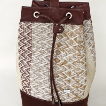 Woven duffel bag with brown leather