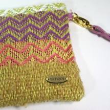 Hand-woven rainbow purse with suede leather