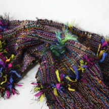 black woven scarf with textures detail