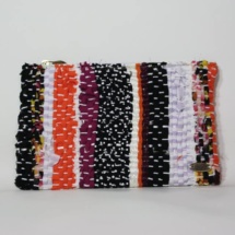 Orange and black woven clutch / woven front