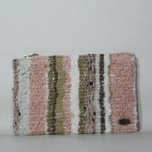 Beige and white woven and plastic clutch front