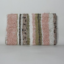 Beige and white woven and plastic clutch back
