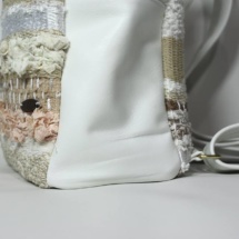 beige backpack detail