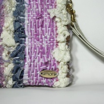Pink and denim purse detail