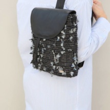 Grey and black woven backpack