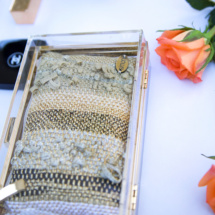 Gold and black transparent and woven clutch 2