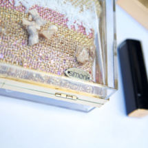 Gold and pink transparent and woven clutch detail