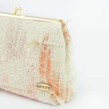 Beige and brown woven clutch