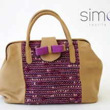 Beige and purple woven bag with bow