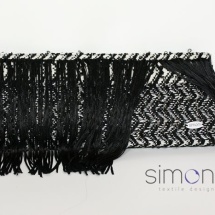 Black, white and silver woven clutch with fringe