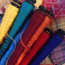 Colorful spools ready for weaving