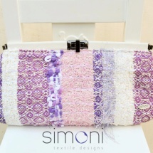 Pastel woven clutch with clip