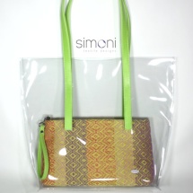 Plastic bag wirh woven purse and green handles
