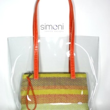 Plastic bag with woven purse and orange handles