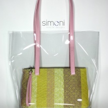 Plastic bag with woven purse and pink handle