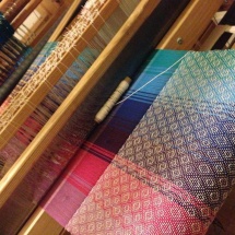 Rainbow fabric with patterns on the loom