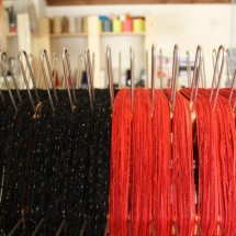 Weaving process: Black and red fabric