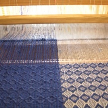 Weaving process: Blue and silver fabric