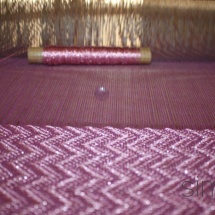 Weaving process :Purple and pink gliterry fabric