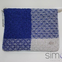 Woven blue and silver zip clutch