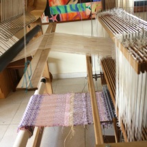 Woven fabric ready to be rolled on the loom