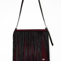 Woven fringed shoulder bag in red and black