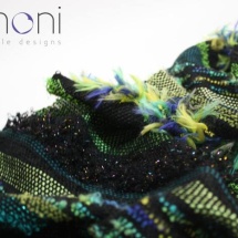Woven green and black shawl : detail