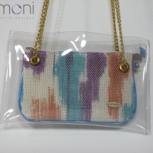 Woven hand dyed mini purse in plastic bag with blue handles