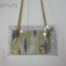 Woven hand dyed mini purse in plastic bag with green handles