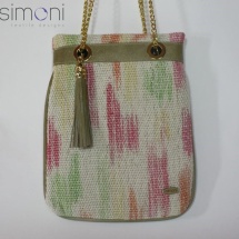 Woven hand dyed shoulder bag with tussle and beige leather