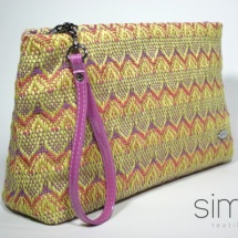 Woven purse with fucsia handles
