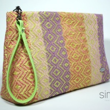 Woven purse with green handle