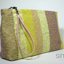 Woven purse with pink handle