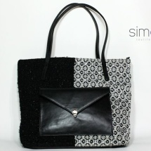 Woven shopper bag with black leather