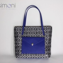 Woven shopper bag with blue leather