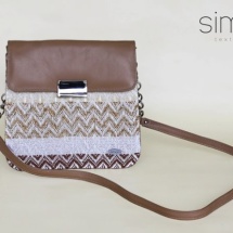 Woven shoulder bag in brown leather