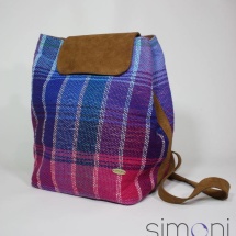 Woven stripped backpack and leather