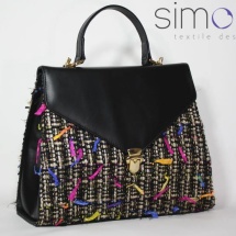 Woven tweed lady like bag in black and gold