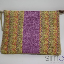 Woven zip clutch with patterns