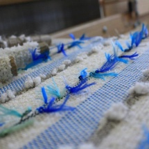 Weaving the blue and neutral cushions