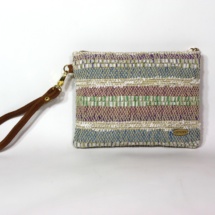 Hand-woven stripped purse with suede leather