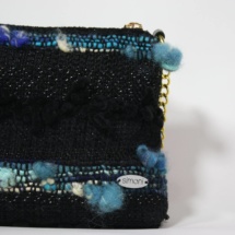 Black and blue purse with chain detail