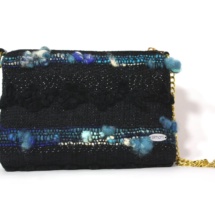 Black and blue purse with chain front