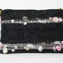Pink and black purse with chain front