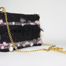 Pink and black purse with chain side