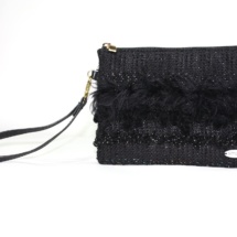 Total black purse with texrures front