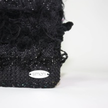 Total black purse with texture details